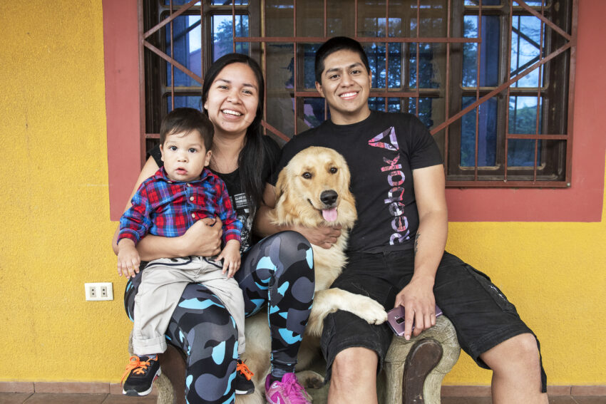 patient with mom, dad and their pet dog.