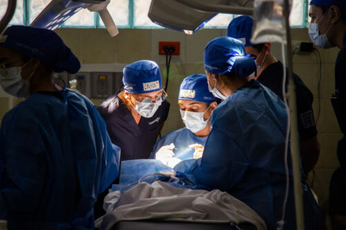 Medical volunteers performing cleft lip surgery