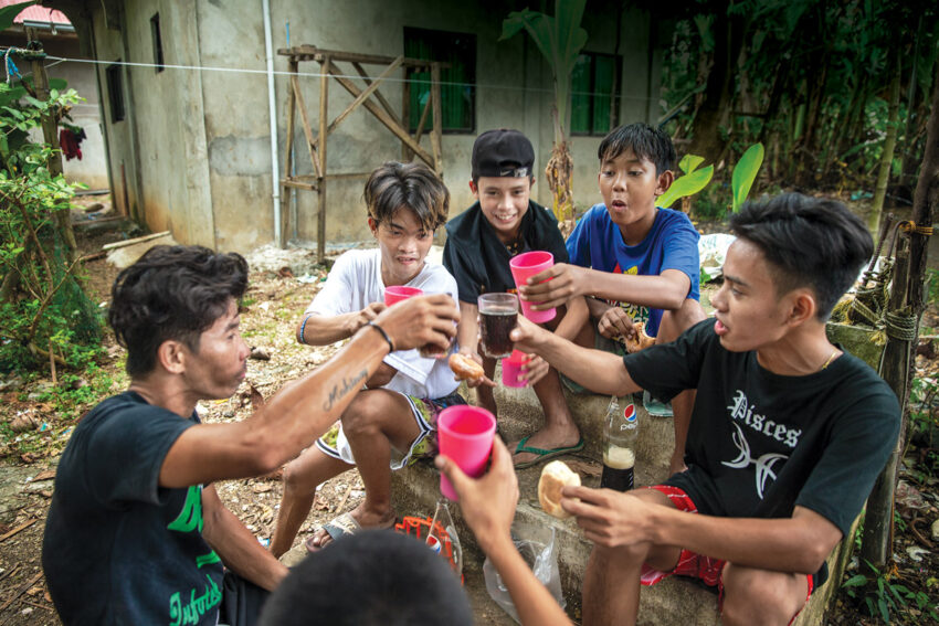 Efren, age 18, with friends.